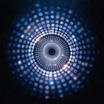 The primary subject of the image is a large, circular, blue light display with a pattern of small, white lights. The display is set against a black background, giving it a striking visual effect. The overall atmosphere of the image is one of intrigue and fascination, as the viewer is drawn into the captivating pattern of the lights.